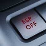 Backlit button of the electronic stability program.